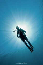 “ she dives “ 
She enjoys the feeling of weightlessness ... by Roland Bach 